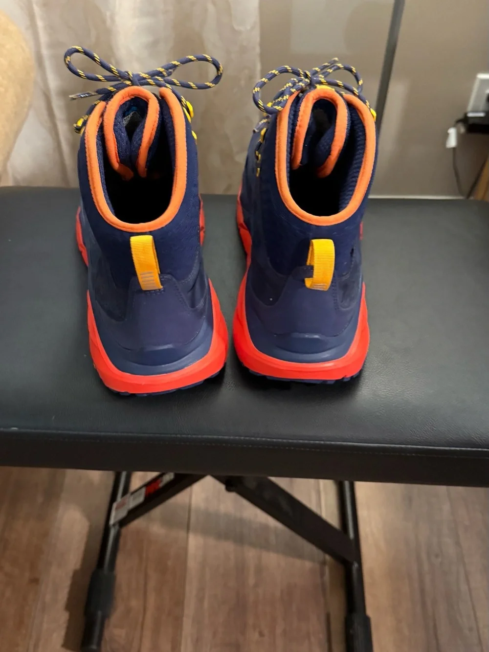 Hoka Men's Trail Boot in Navy Blue with Bright Red Midsole